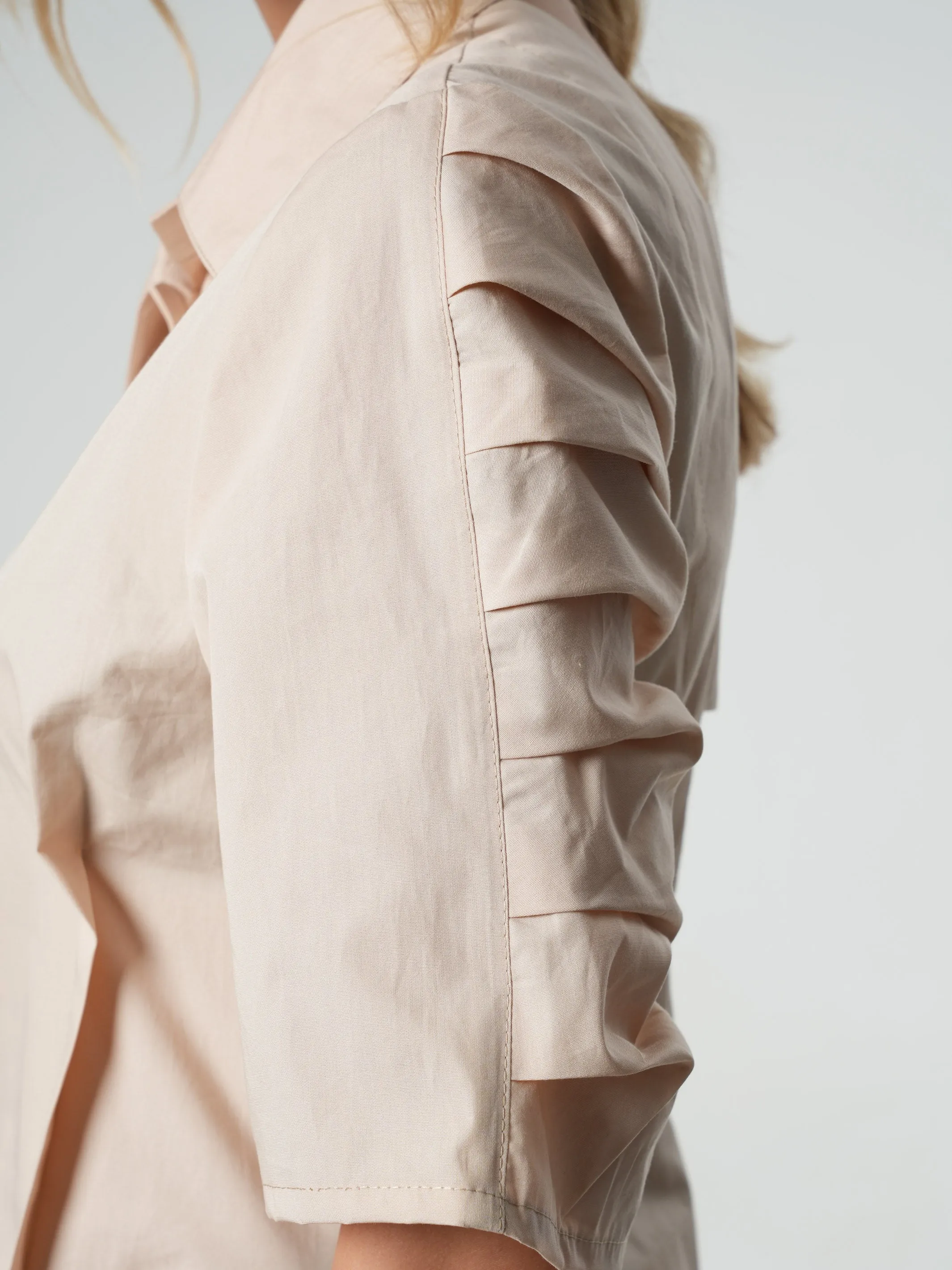 Asymmetric Shirt With Open Back In Beige