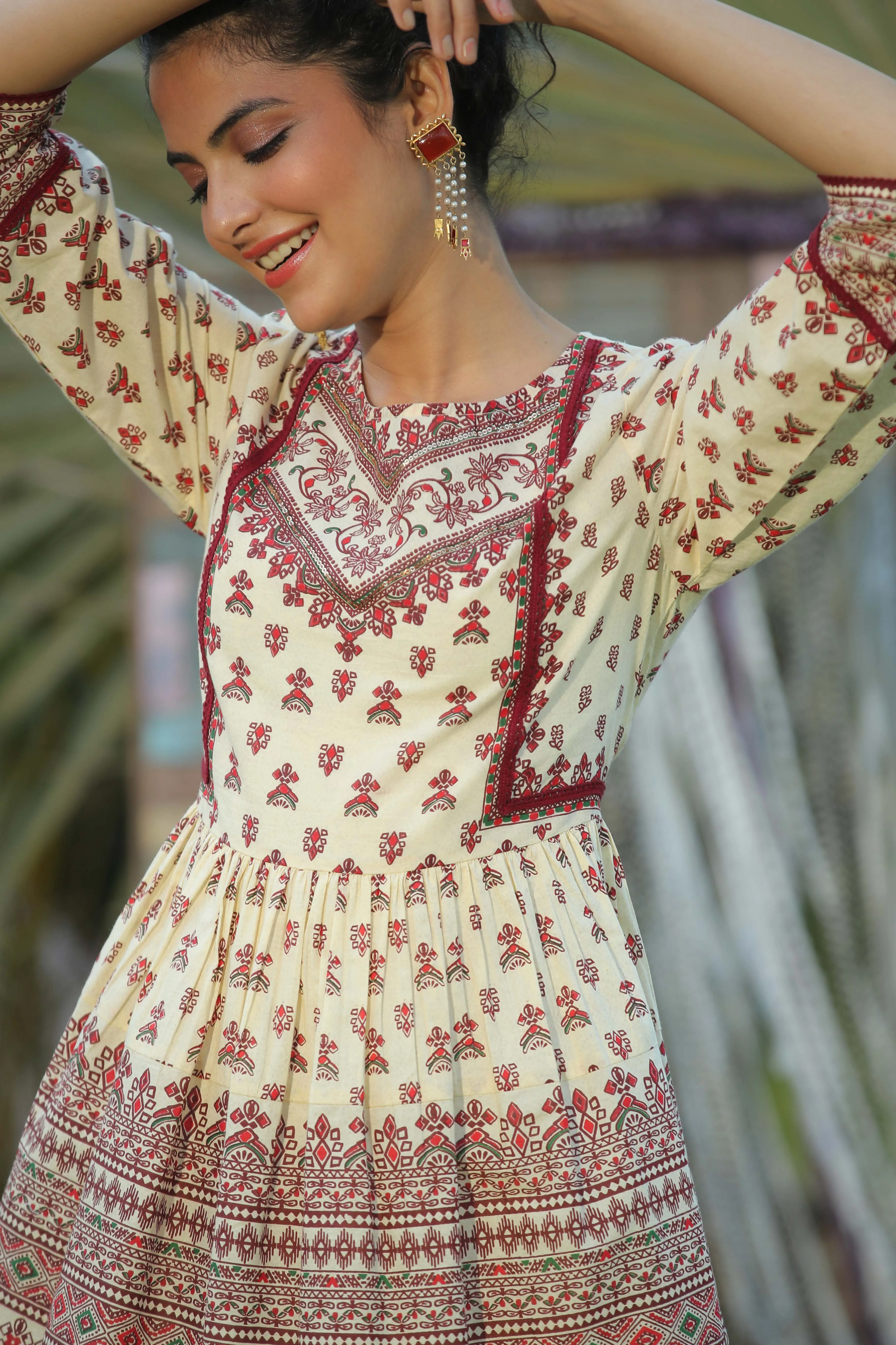 Creme Cotton Cambric Printed Peplum Tunic