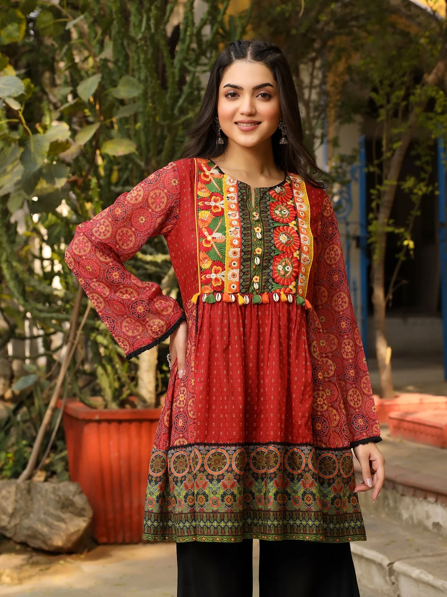 Jashvi Rust Ethnic Motif Printed Cotton & Chiffon Peplum Tunic With Thread Embroidery & Tassels